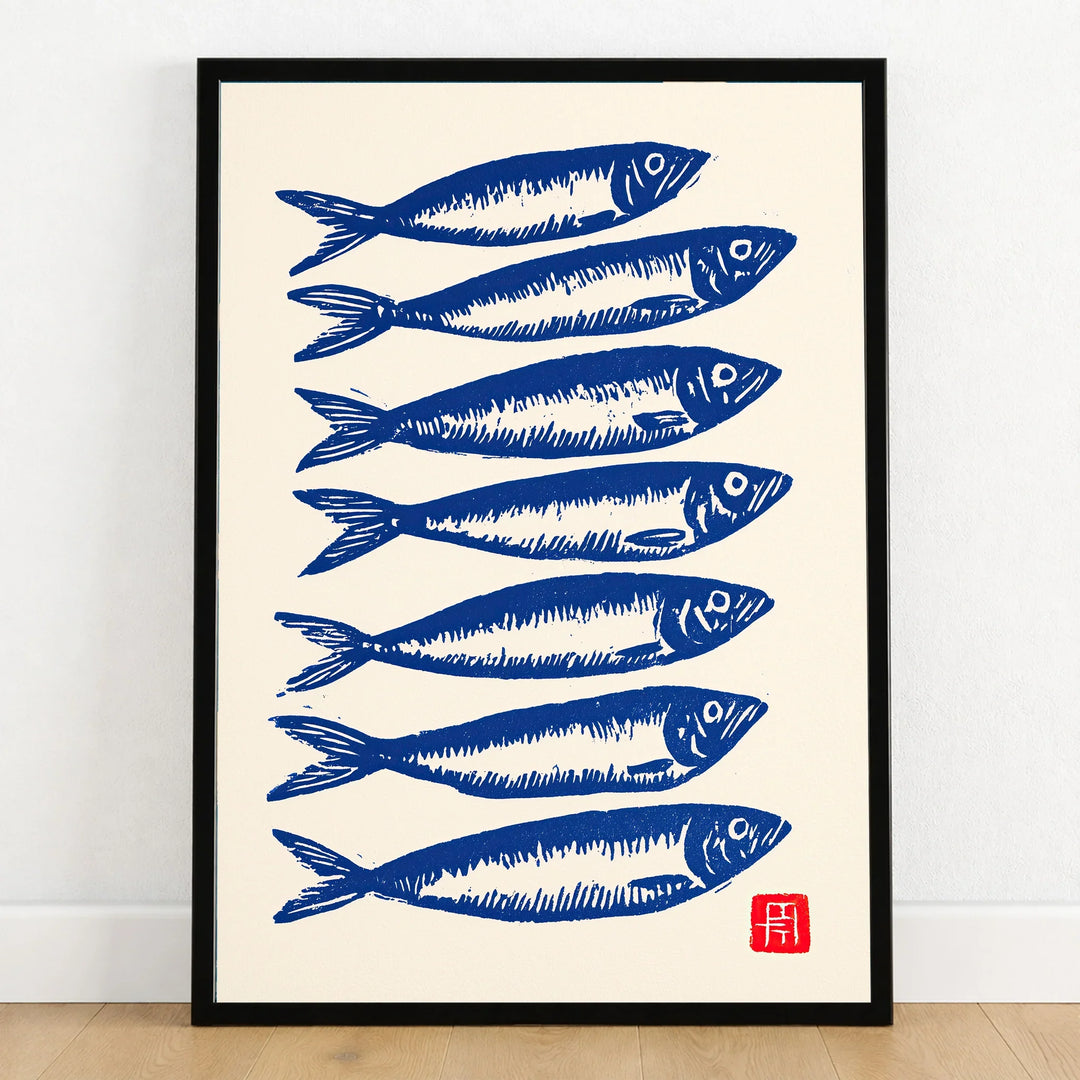 Japanese Fish Art Print – Blue Sardine Coastal Wall Art — art print in black frame on wooden floor