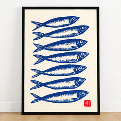 Japanese Fish Art Print – Blue Sardine Coastal Wall Art — art print in black frame on wooden floor