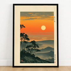 Japanese Sunset Art Print – Orange Vintage Landscape Wall Art — art print in black frame on wooden floor