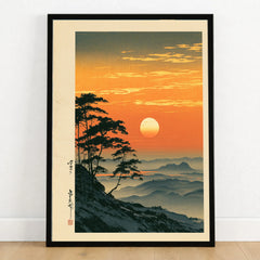 Japanese Sunset Print – Vintage Misty Mountain Wall Art — art print in black frame on wooden floor