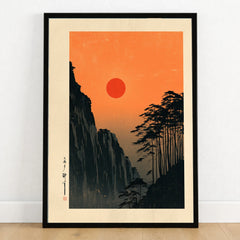 Red Sun Japanese Art Print – Vintage Sunset Wall Art — art print in black frame on wooden floor
