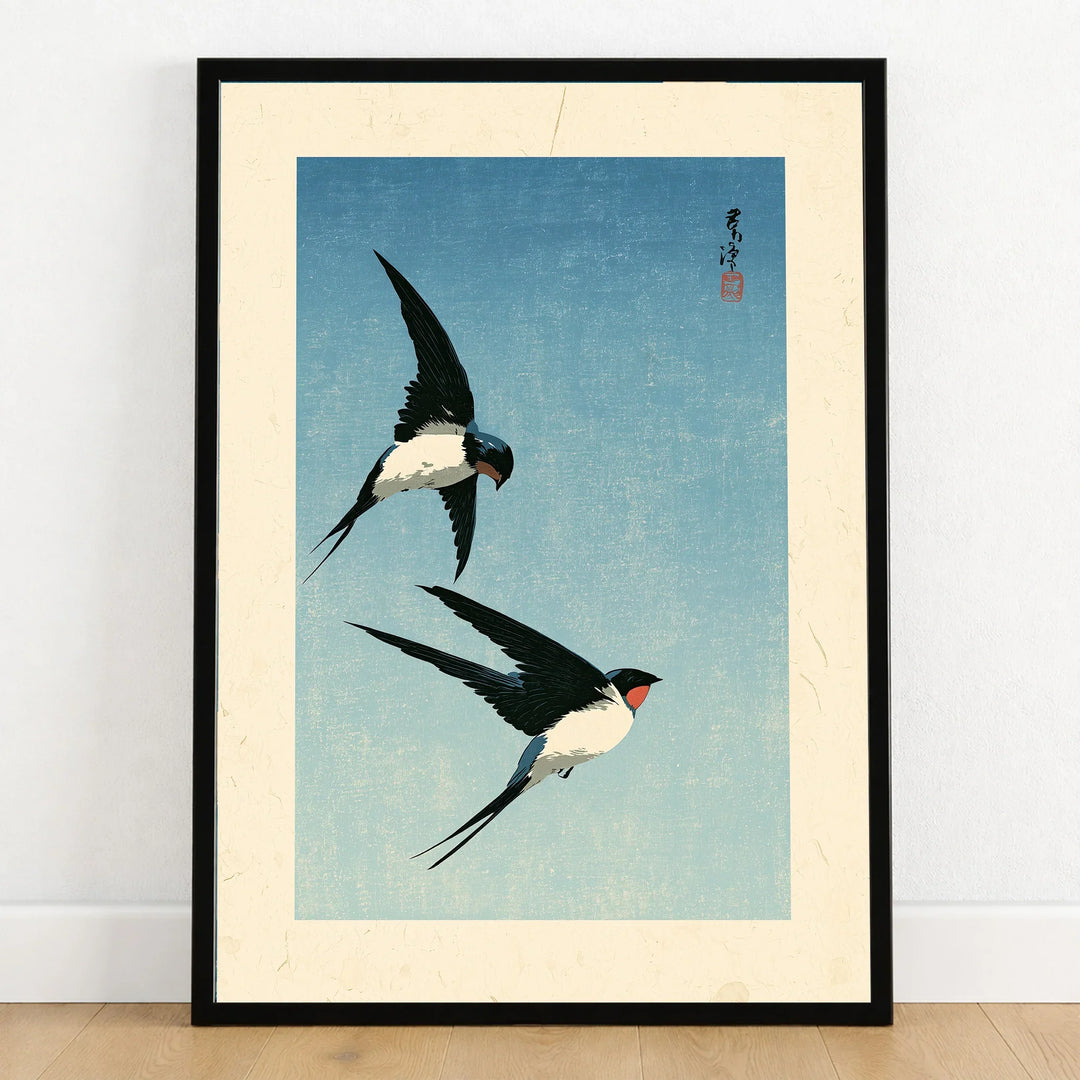 Japanese Swallow Bird Art Print – Vintage Blue Wall Art — art print in black frame on wooden floor