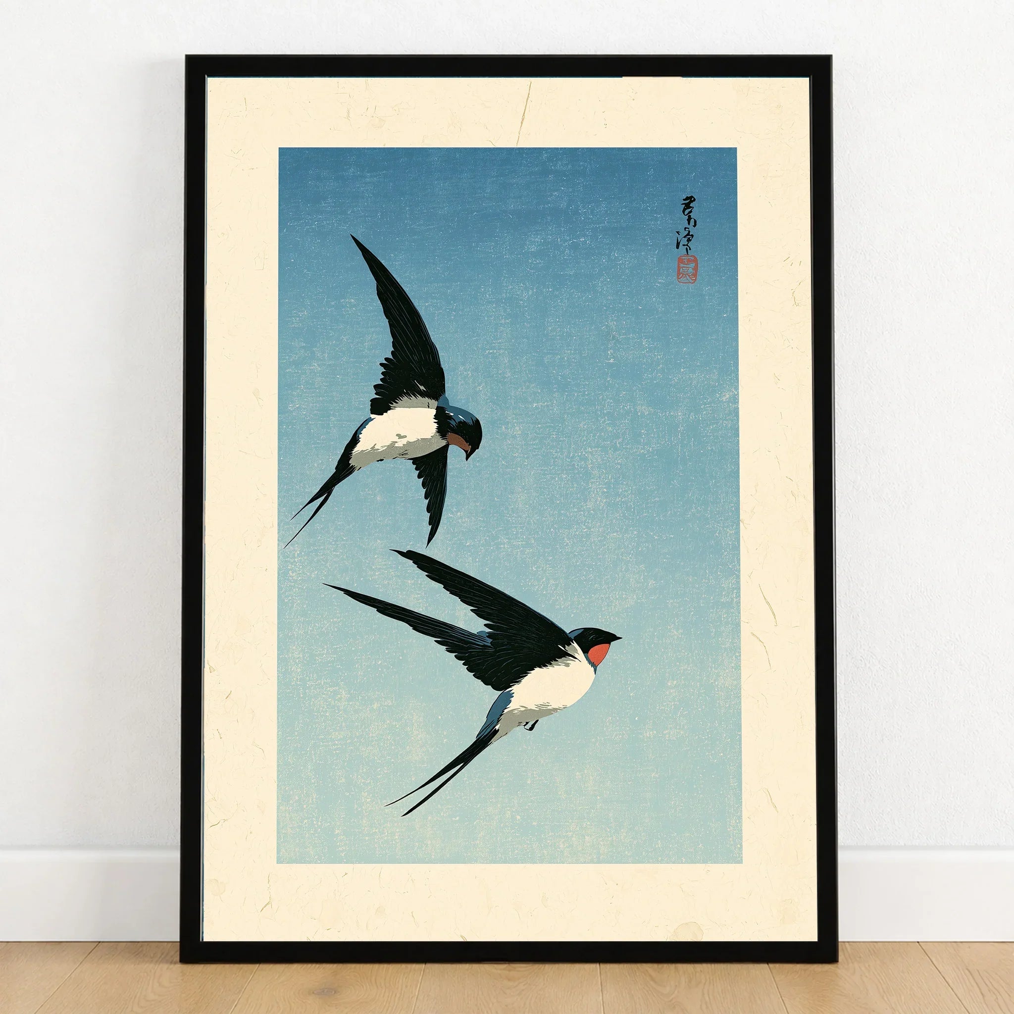 Japanese Swallow Bird Art Print – Vintage Blue Wall Art — art print in black frame on wooden floor