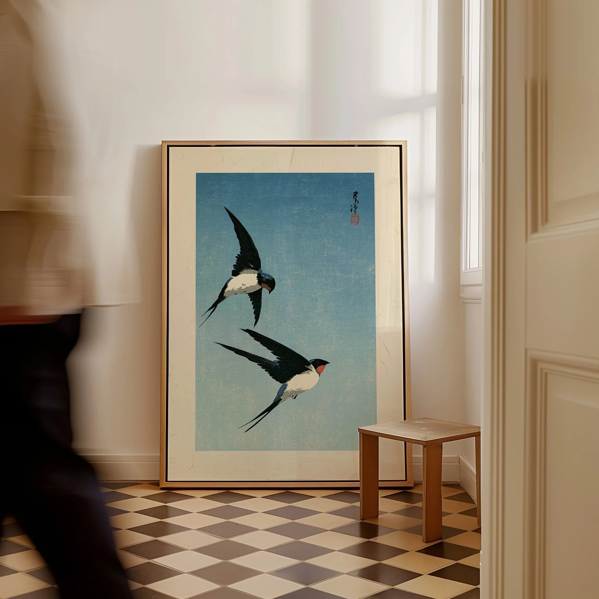 Japanese Swallow Bird Art Print – Vintage Blue Wall Art — framed canvas on floor man walking past