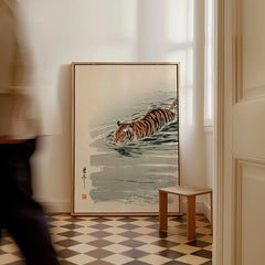 Japanese Tiger Art Print – Vintage Swimming Tiger Wall Art — framed canvas on floor man walking past