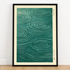 Japanese Water Art Print – Zen Ripple Wall Art — art print in black frame on wooden floor