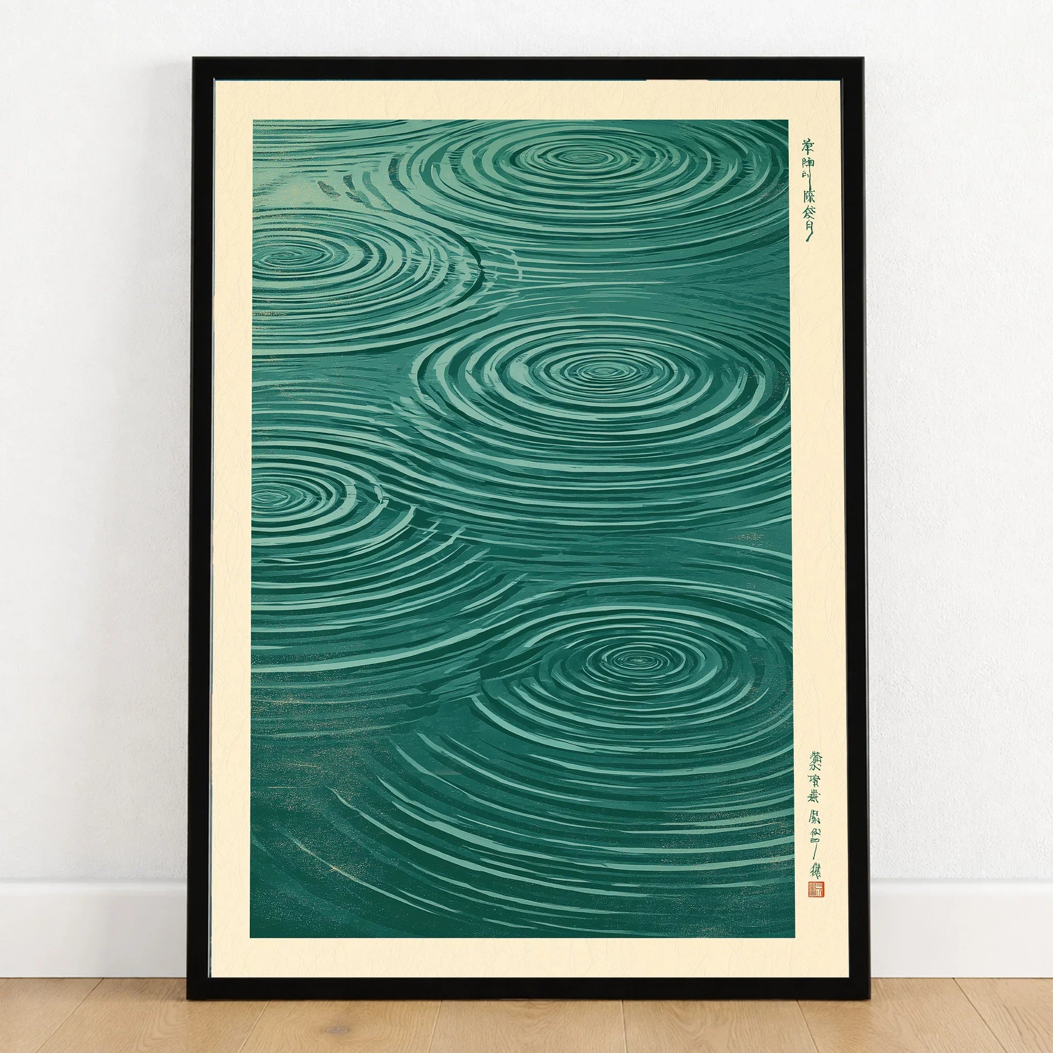 Japanese Water Art Print – Zen Ripple Wall Art — art print in black frame on wooden floor