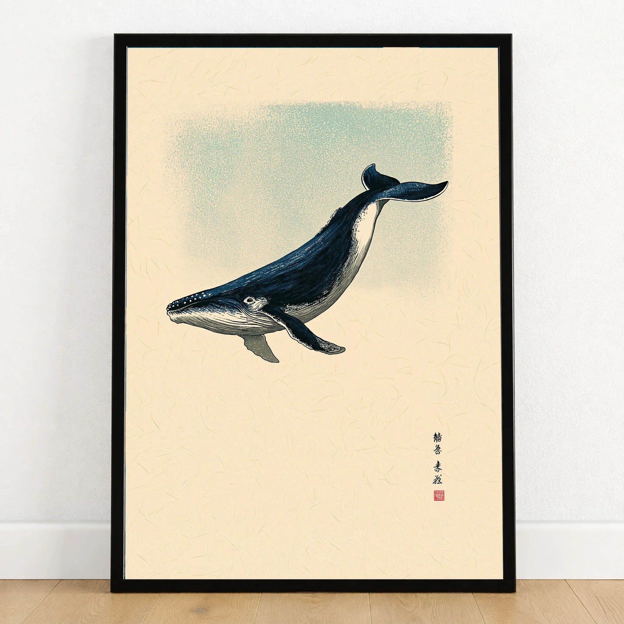 Japanese Whale Art Print – Vintage Sea Life Wall Art — art print in black frame on wooden floor