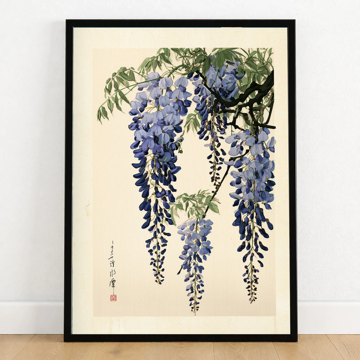 Japanese Wisteria Art Print – Blue Botanical Wall Art — art print in black frame on wooden floor