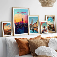 Johannesburg Skyline Poster - South Africa Cityscape Wall Art Print displayed among other cityscape art prints on a cozy bed.