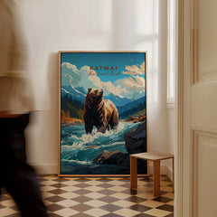 Framed Katmai National Park poster with a bear in a river, leaning on floor in a bright room