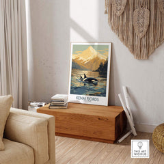 Kenai Fjords National Park print featuring orcas in front of an Alaskan sunset, displayed in a cozy living room setting.
