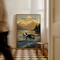 Kenai Fjords National Park travel poster with orca and mountain, framed on floor in entryway
