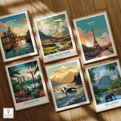 Set of six framed travel posters on wooden floor, featuring Venice, Paris, Singapore, Kenai Fjords National Park, the Highlands, and Sri Lanka.