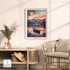 Keswick Lake District Travel Print framed in a room with a scenic view of mountains and a lake at sunset.