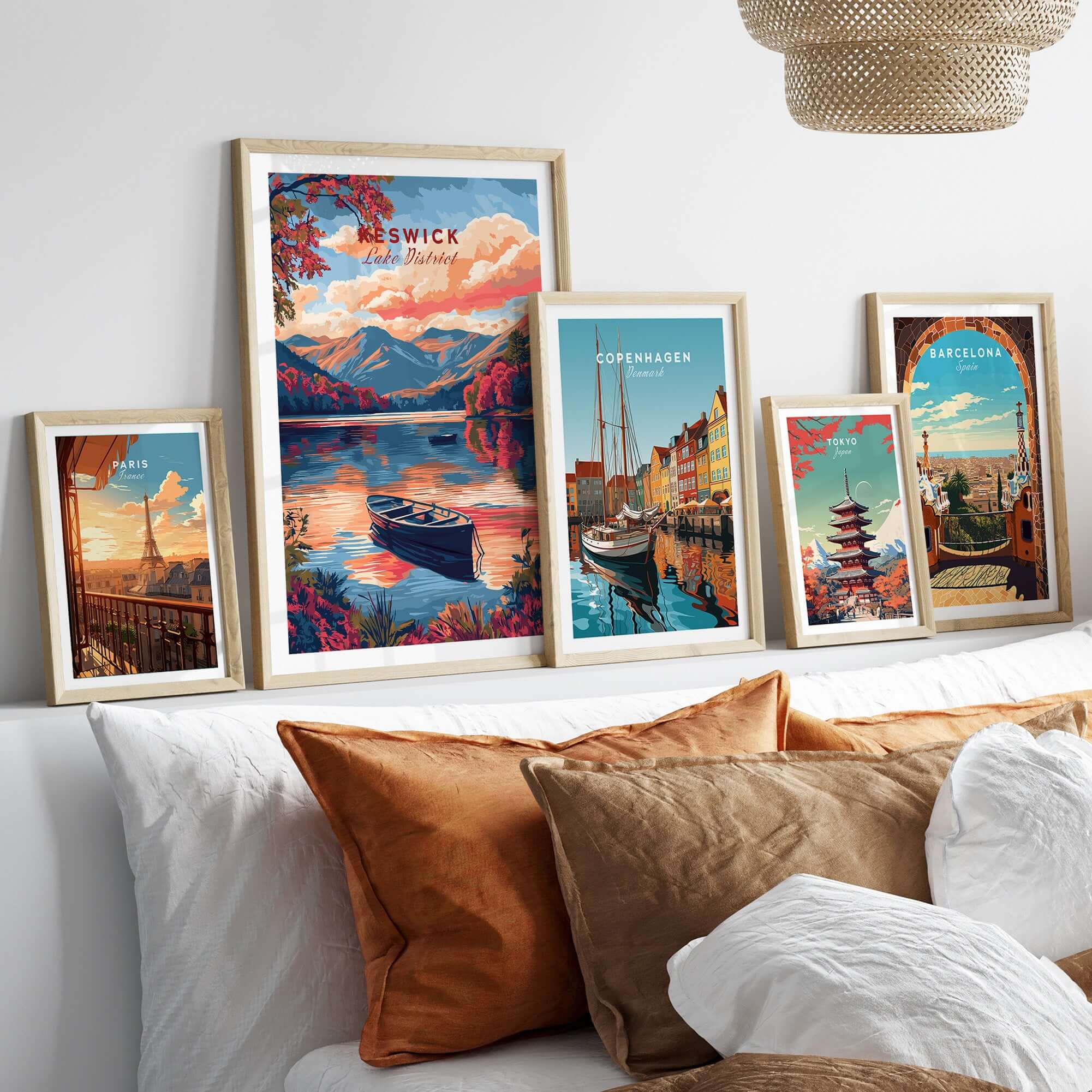 Keswick Lake District Travel Print displayed among other travel prints in a stylish living room setting.