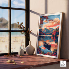 Keswick Lake District Travel Print framed on a windowsill, showcasing a vibrant sunset over serene waters and mountains.