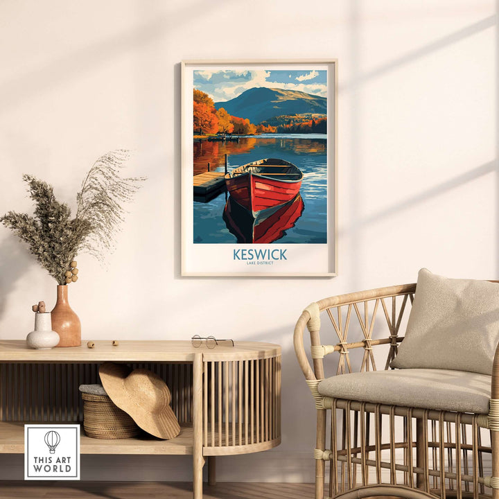 Keswick Poster showcasing a vibrant red boat on a serene lake surrounded by autumn colors in a cozy interior setting.