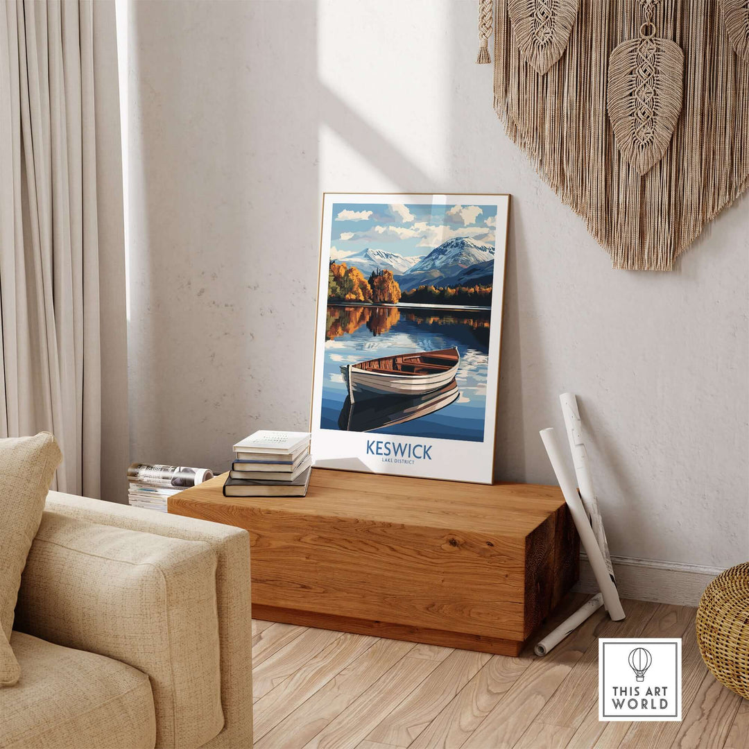 Keswick poster showcasing the Lake District, featuring a serene lake view with mountains and a boat.