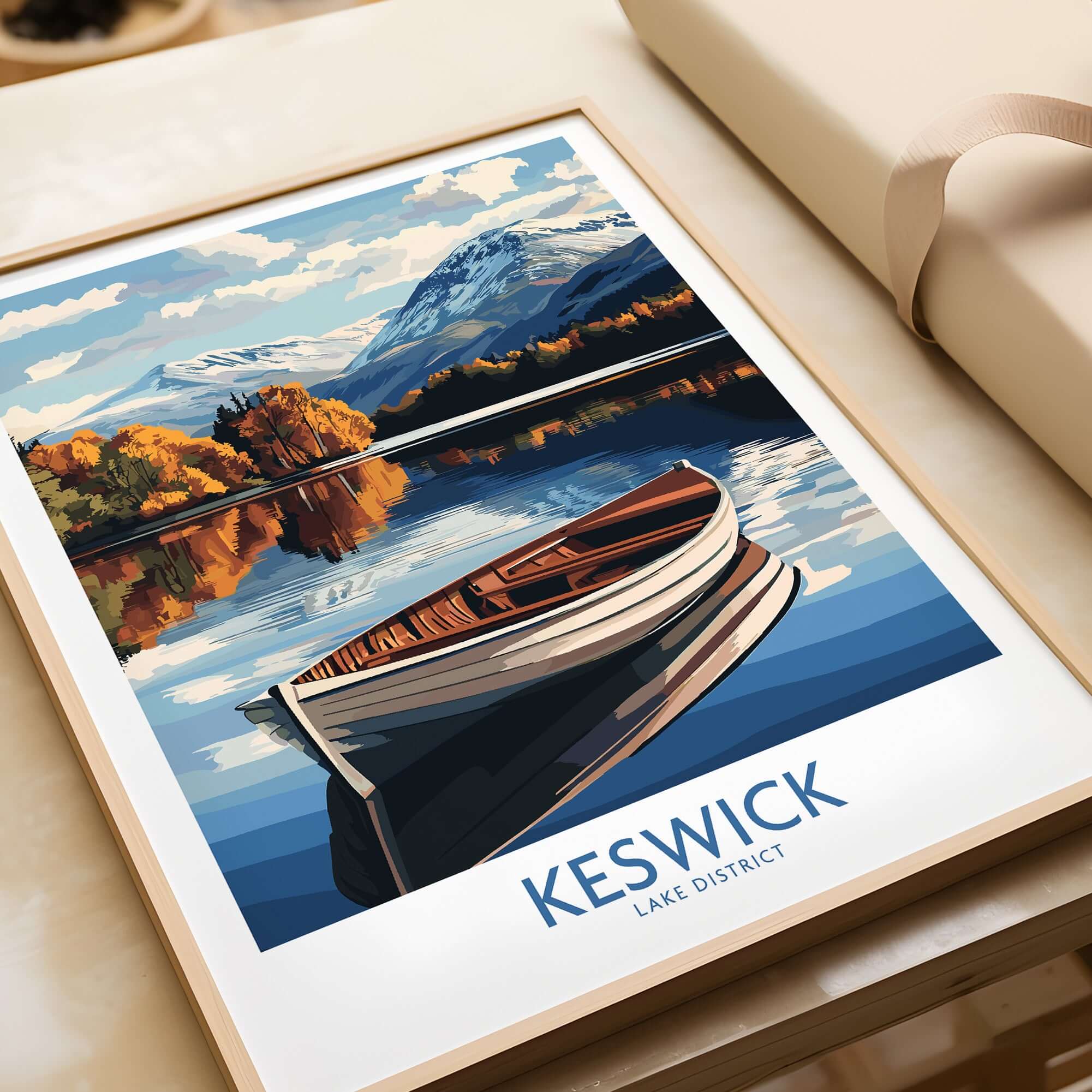 Keswick Poster Lake District showcasing a serene boat on a still lake surrounded by colorful autumn trees and mountains.