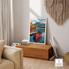 Keswick Print featuring a vibrant boat on a serene lake, capturing the beauty of the Lake District.
