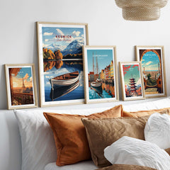 Framed Keswick Print Lake District artwork displayed on a wall with various travel prints and cozy cushions.