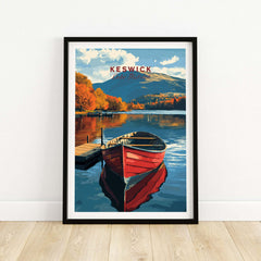Keswick Print featuring a red boat on calm water with vibrant autumn colors and scenic Lake District mountains.