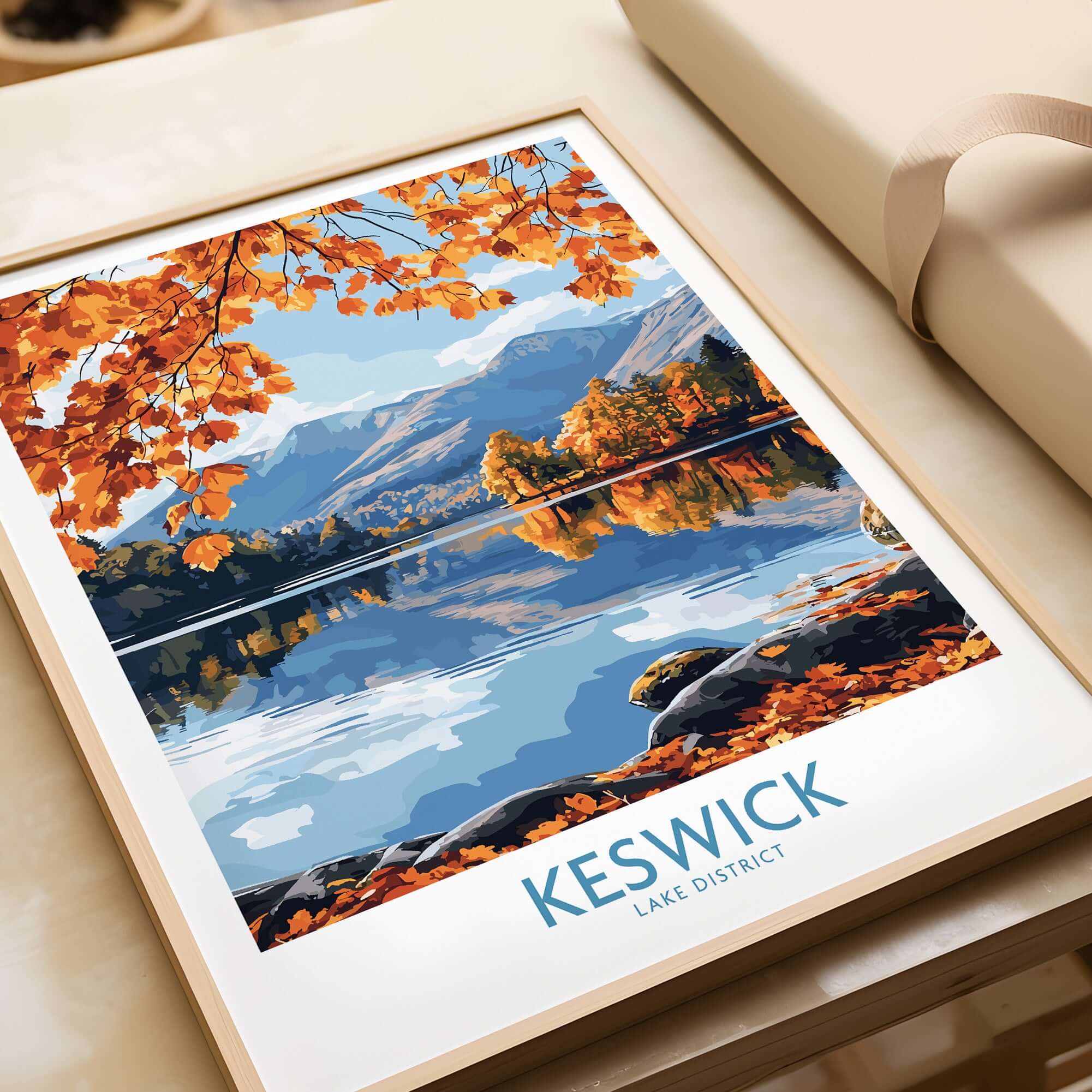 Keswick Travel Poster showcasing autumn scenery in the Lake District with vibrant fall colors and serene lake reflection.