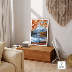 Keswick Travel Print showcasing autumn colors and tranquil Lake District scenery in a stylish interior setting.