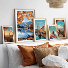 Keswick Travel Print displayed in a beautiful arrangement of travel prints on a stylish sofa, showcasing Lake District scenery.