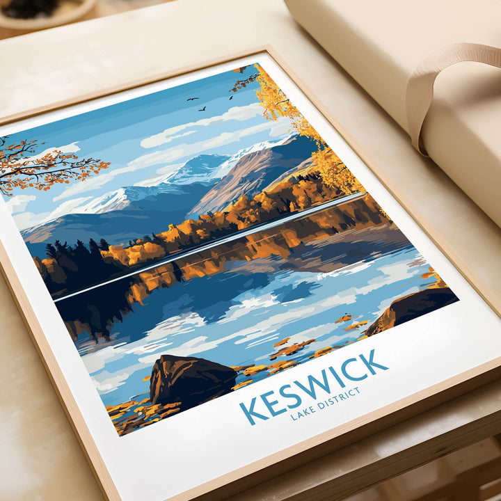 Keswick Wall Art Print depicting the Lake District's stunning scenery with mountains and reflective water in autumn colors.