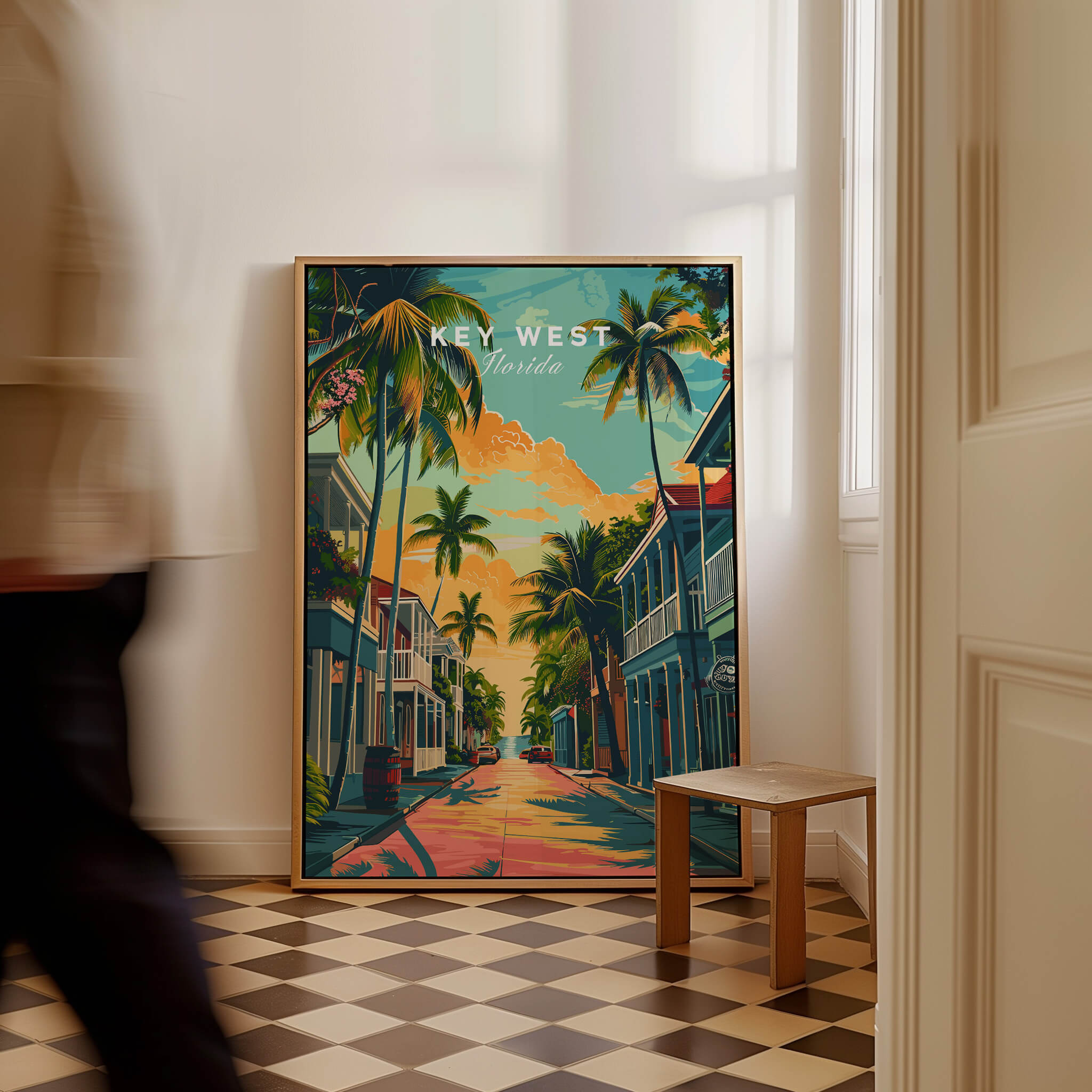 Key West Wall Art Print - Florida Travel Poster displayed in a stylish interior, featuring vibrant palms and a tropical scene.
