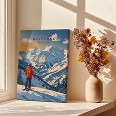 Keystone Travel Poster - Colorado featuring a skier against snowy mountains and sunlight.