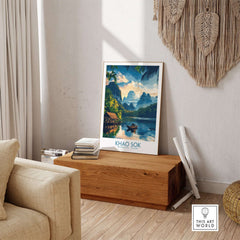 Khao Sok Travel Poster featuring lush greenery and crystal clear waters of Khao Sok National Park in a cozy interior setting.
