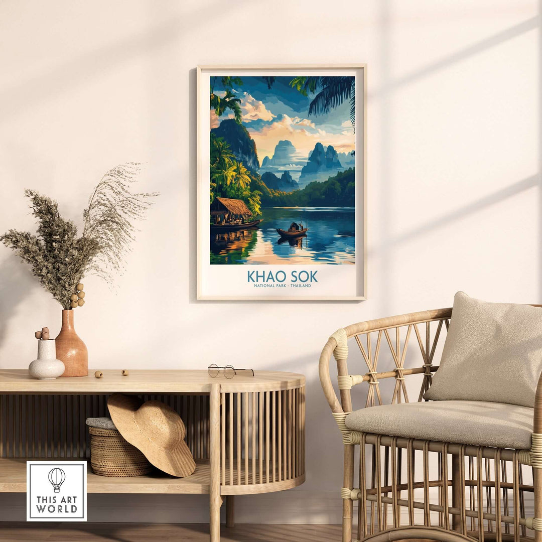 Khao Sok travel poster featuring a serene landscape with mountains and a river, displayed in a stylish interior setting.