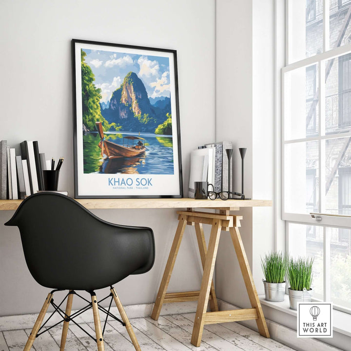 Khao Sok wall art print displayed in a modern office with black chair and wooden desk, featuring a scenic landscape.