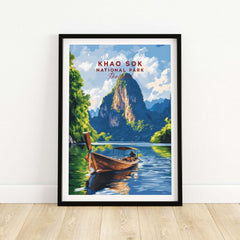 Khao Sok Wall Art Thailand featuring a beautiful boat on tranquil waters surrounded by lush cliffs.