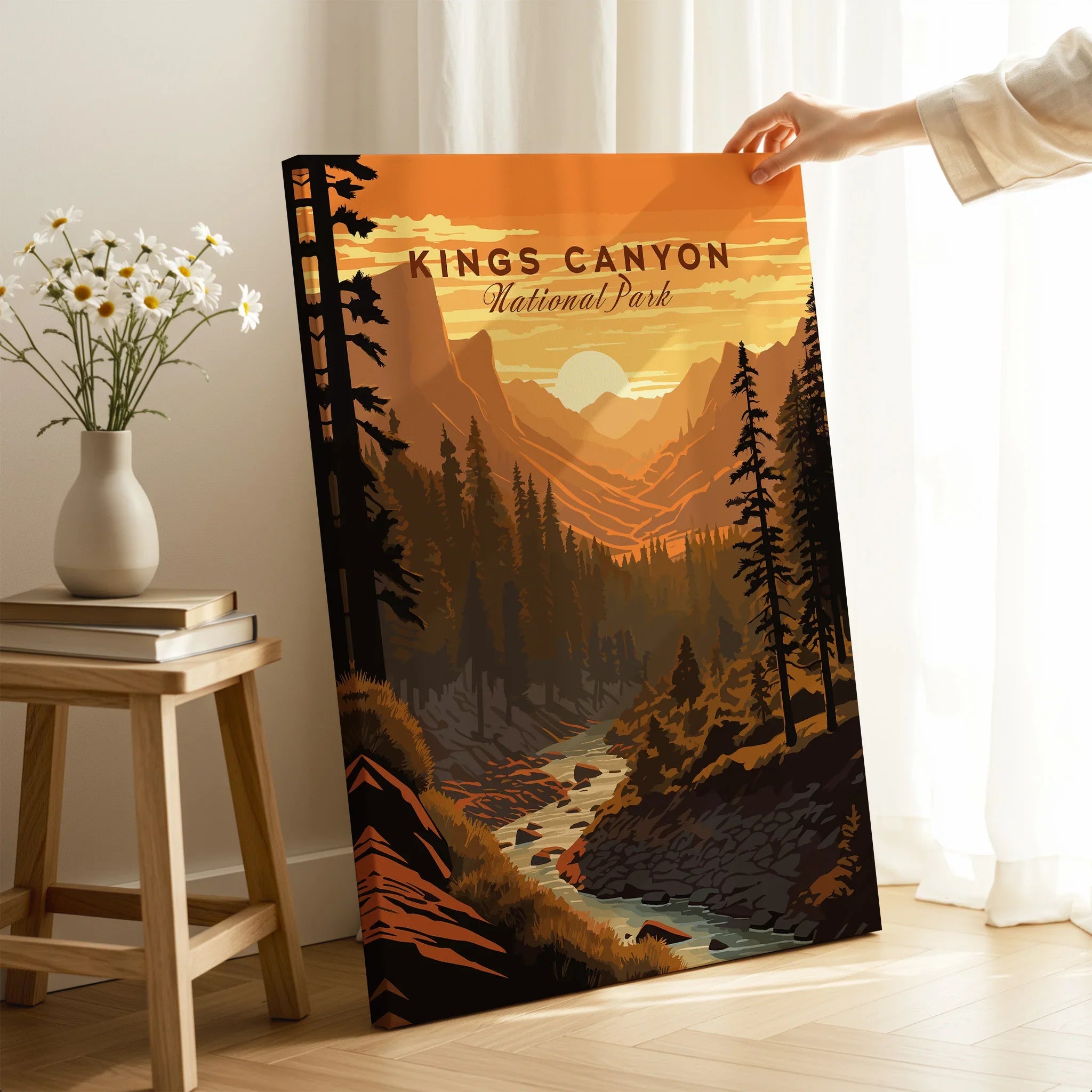 Kings Canyon National Park canvas print with sunset mountain landscape, hand holding artwork in modern room