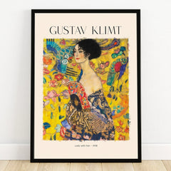 Framed Gustav Klimt Lady with Fan wall art print featuring colorful floral background