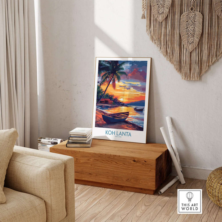 Koh Lanta Thailand poster showcasing a vibrant sunset over a tranquil beach with a boat in a stylish home setting.