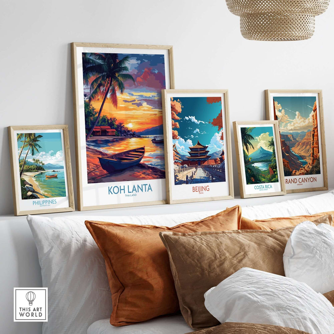 Vibrant Koh Lanta Thailand poster among travel-themed art prints on a stylish wall display. Perfect for decor enthusiasts.