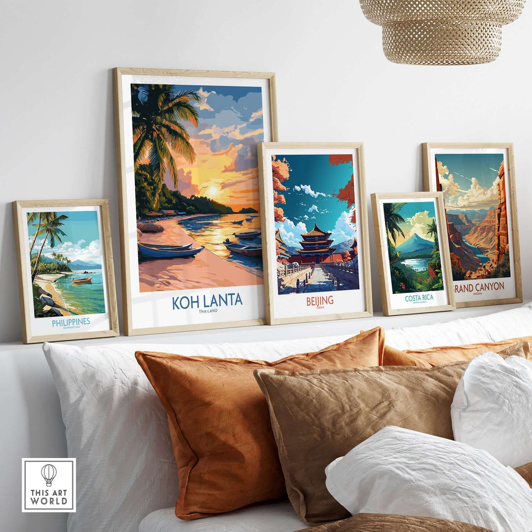 Koh Lanta travel poster displayed among other travel posters on a modern sofa, enhancing home decor and adventure inspiration.