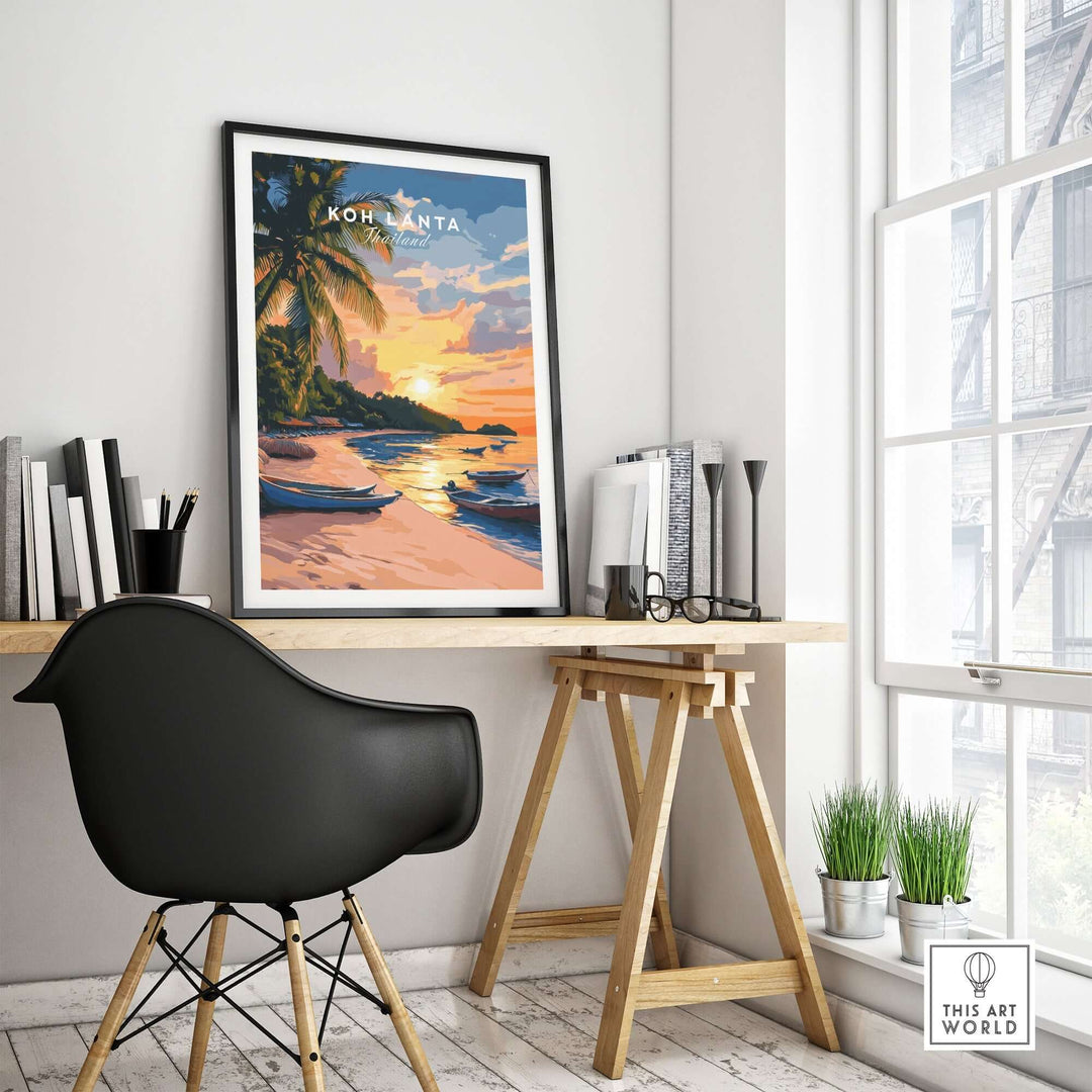 Koh Lanta travel print displayed in a modern workspace, showcasing a tropical sunset and beach scenery. Perfect for home decor.