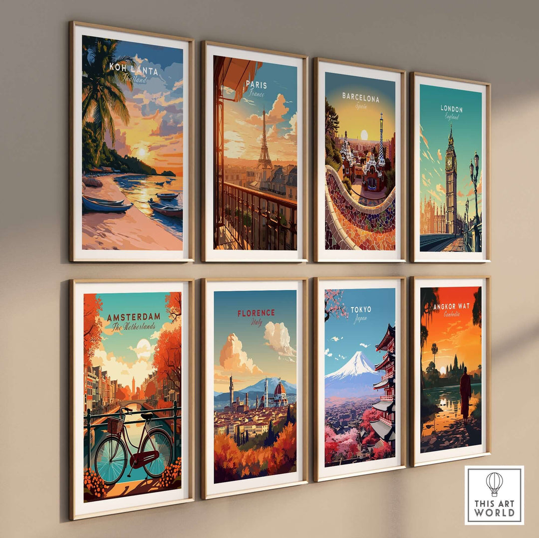 Various travel prints displayed on a wall, including Koh Lanta, Paris, Barcelona, and more, showcasing iconic destinations.