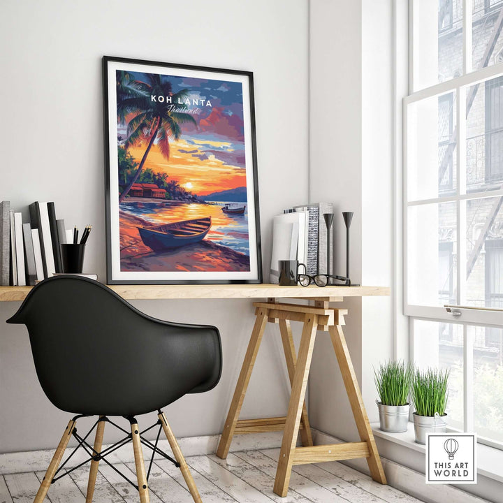 Koh Lanta wall art framed in a stylish room, featuring vibrant sunset and boat design, creating a serene atmosphere.