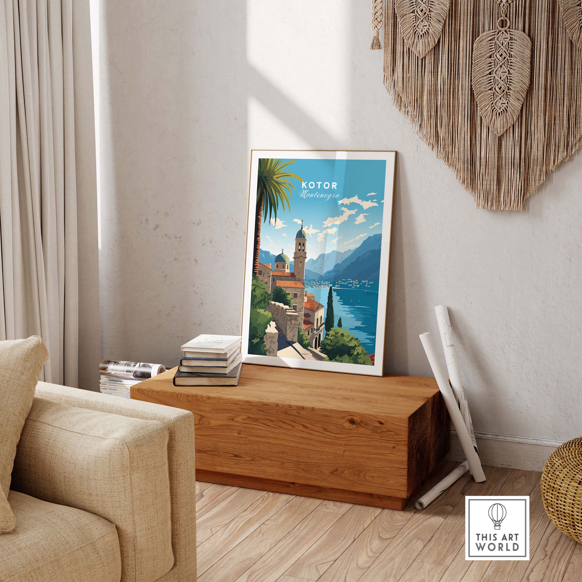 Vibrant Kotor Montenegro travel poster print displayed in a stylish living room setting on a wooden table.