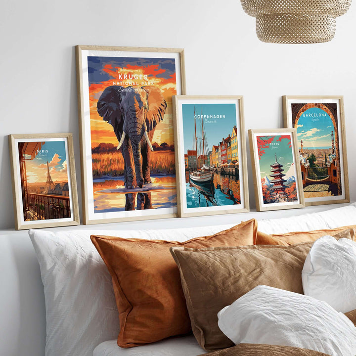 Framed Kruger National Park elephant art print and cityscape posters on a stylish bedroom wall.