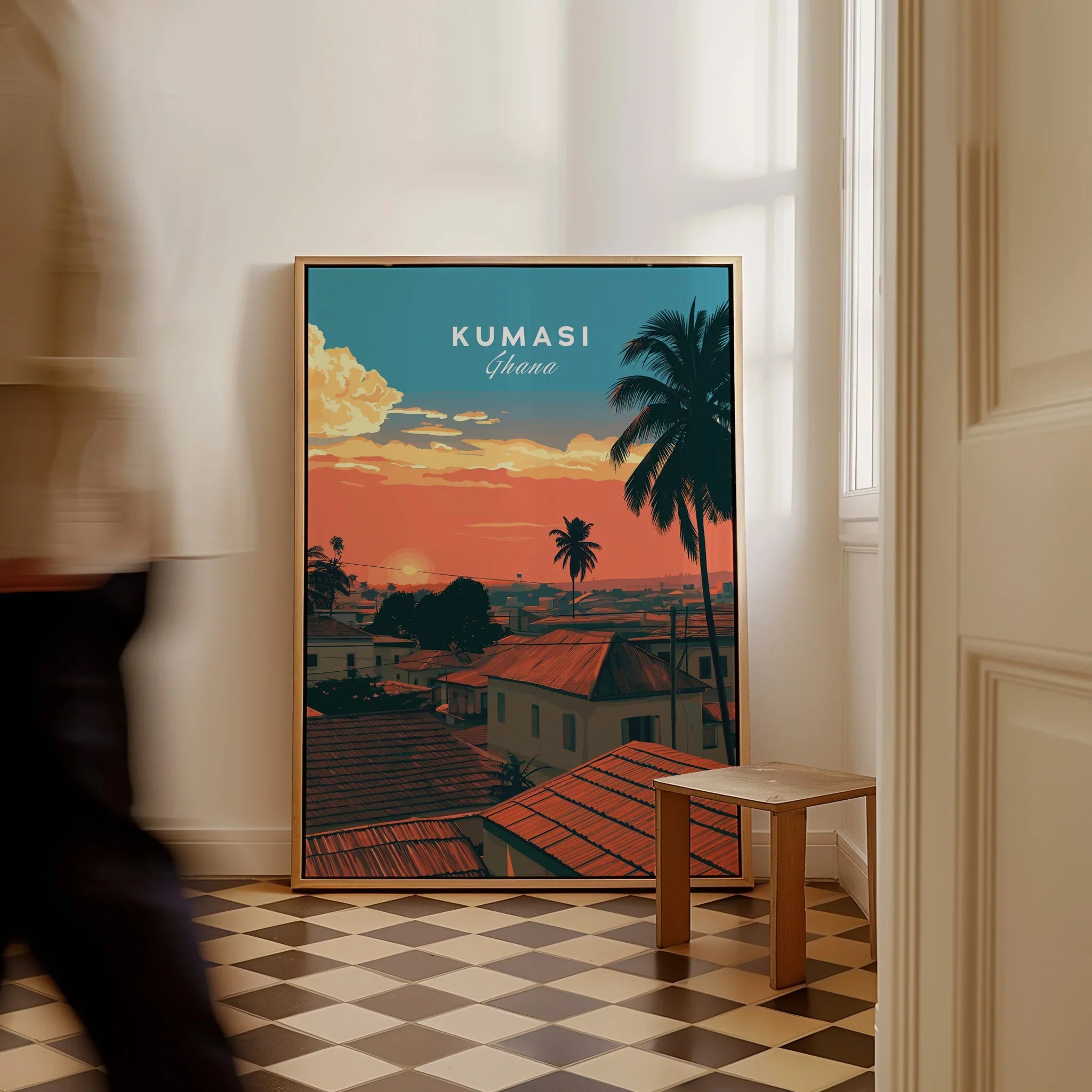 Kumasi Ghana Sunset Travel Poster — framed canvas on floor man walking past