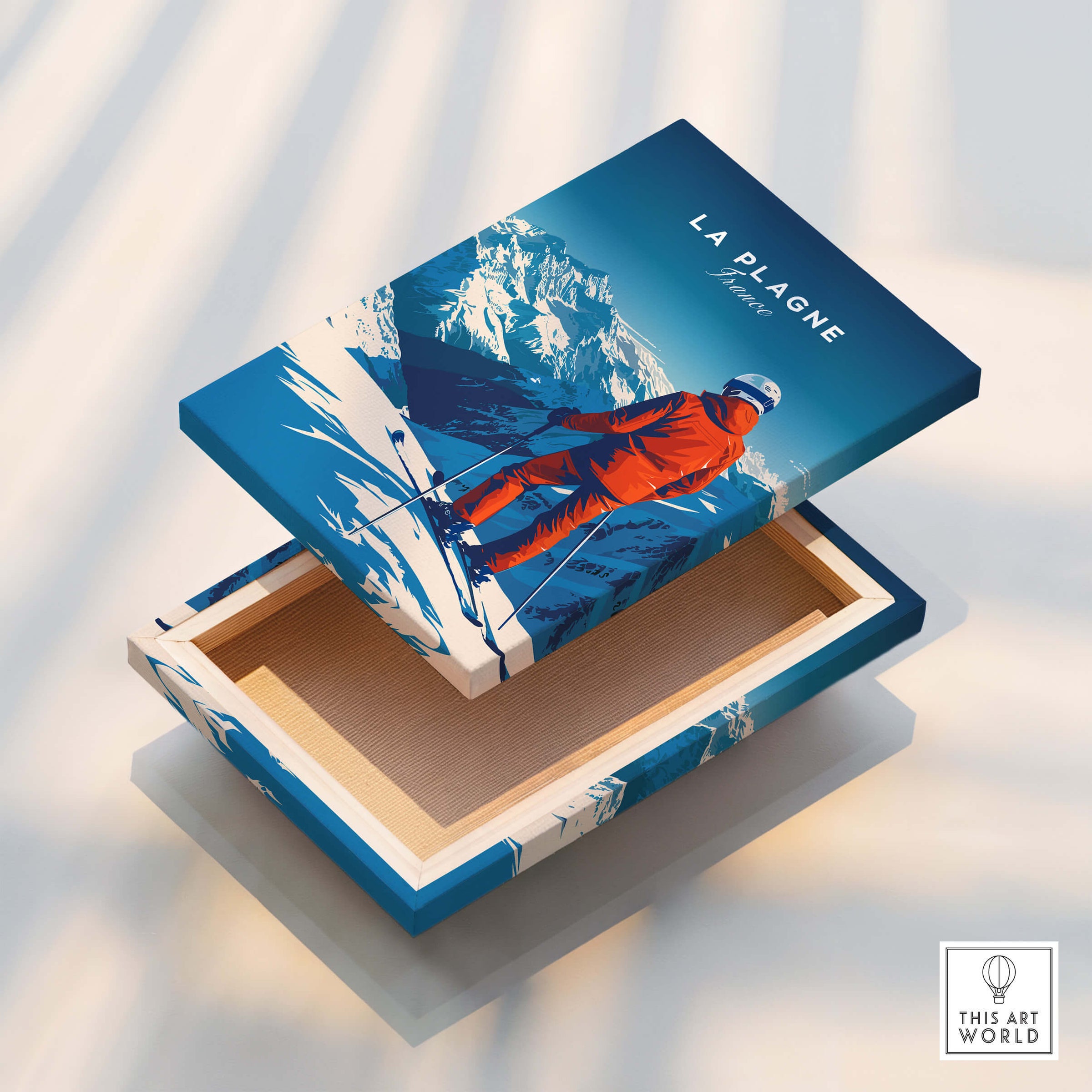 La Plagne Travel Poster artwork on a wooden box showcasing a skier against a snowy mountain backdrop.