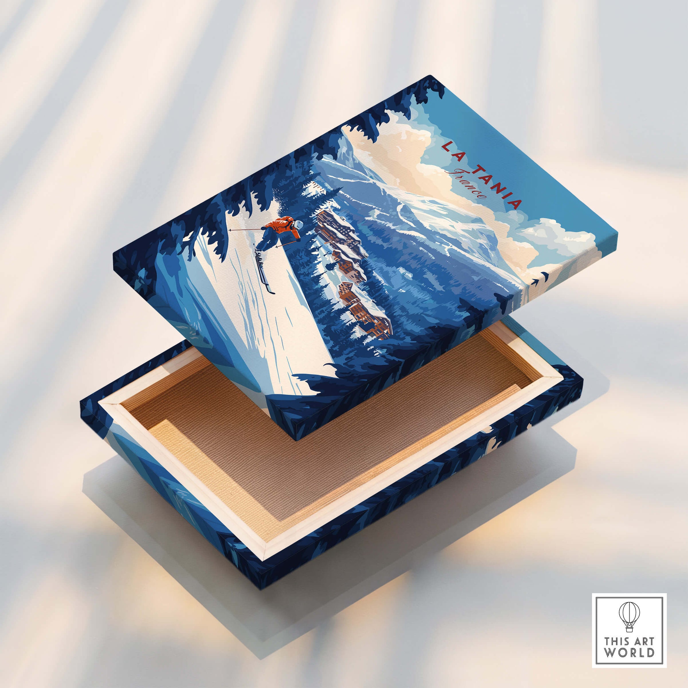 La Tania Ski Print design on a decorative box showcasing a skier against snowy mountains.